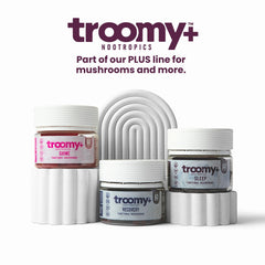 Bottle being poured from Troomy Sleep Gummies for easy nightly access