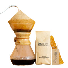Pouring TruBrain enhancer to illustrate easy dosing with coffee