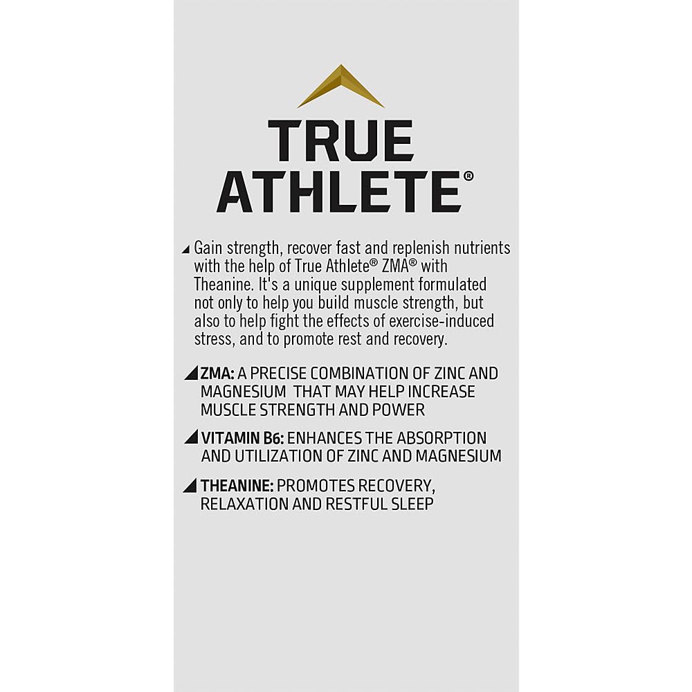 Nighttime routine setup with True Athlete capsules on a desk