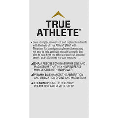 Nighttime routine setup with True Athlete capsules on a desk