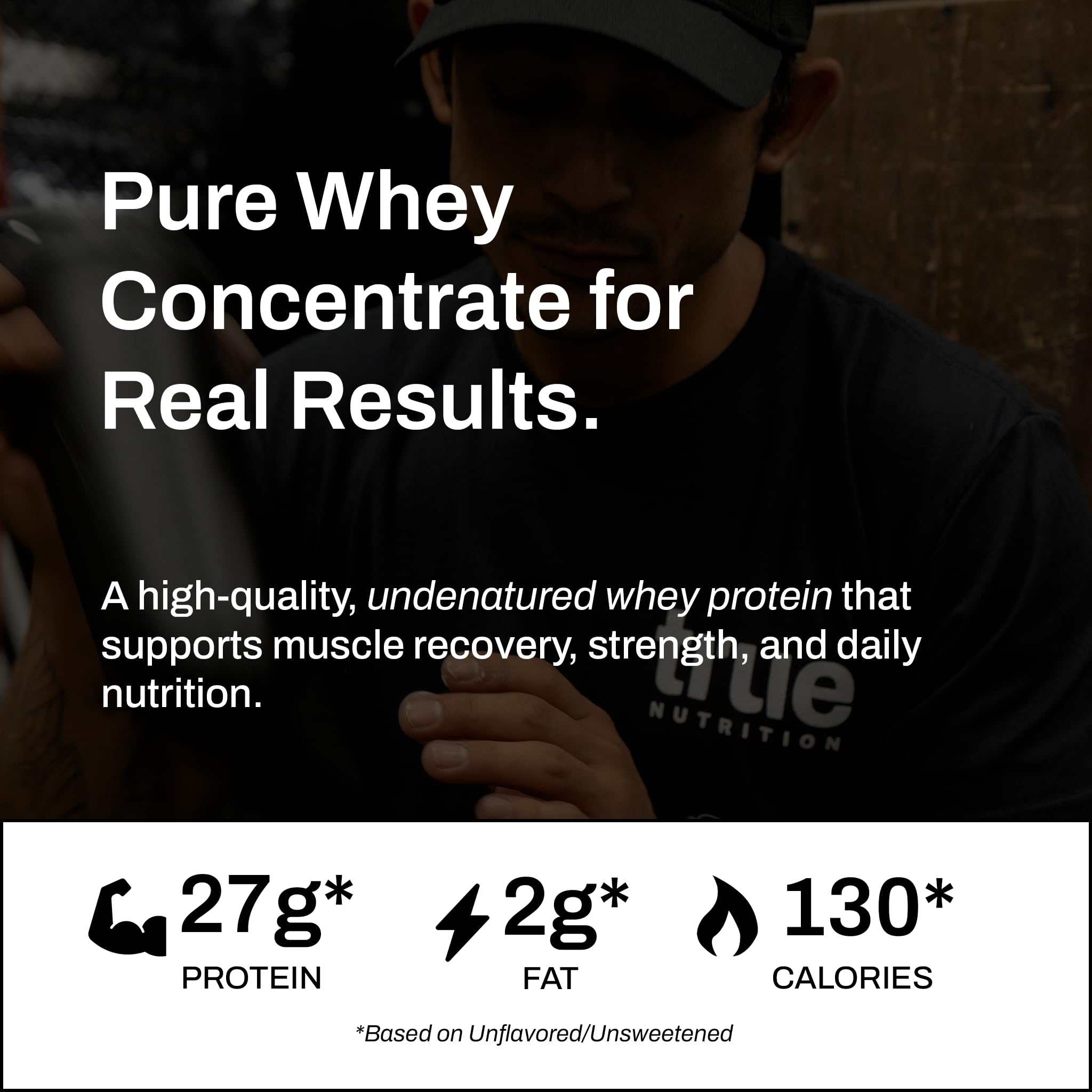 True Nutrition whey concentrate bottle with scoop ready to mix.