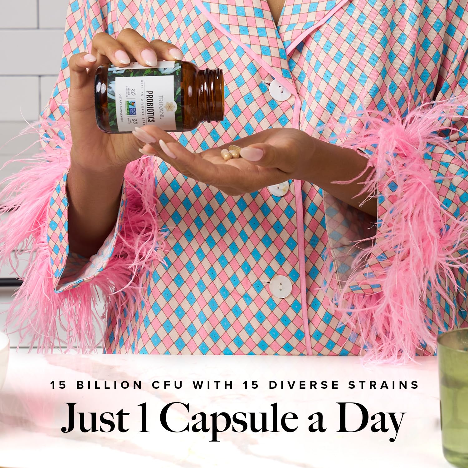 Truvani probiotic capsules poured into a hand illustrate an easy daily gut health routine.