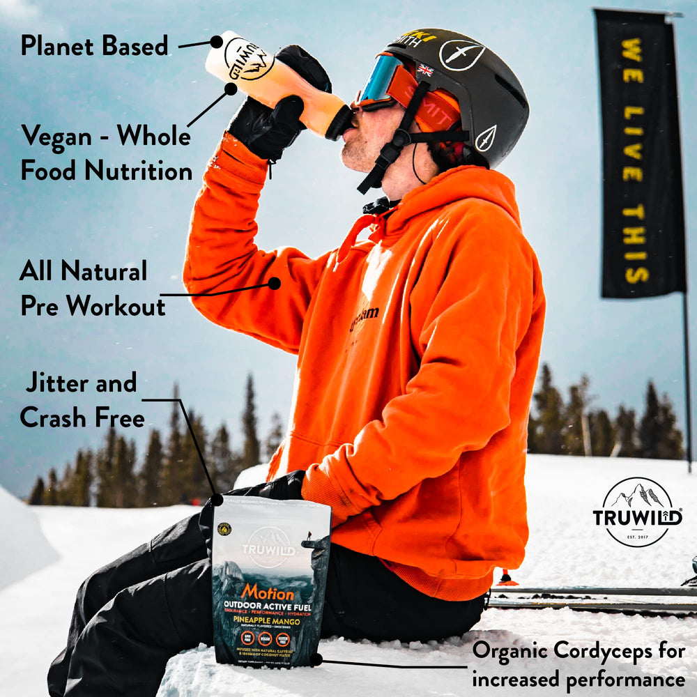 TruWild Motion powder being poured for quick, smooth mixing.