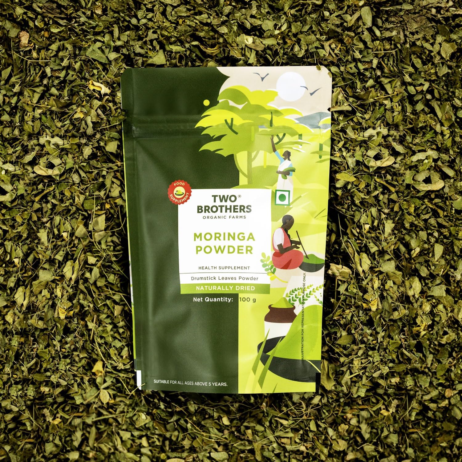 Two Brothers India Farms Moringa powder closeup reveals vibrant green texture