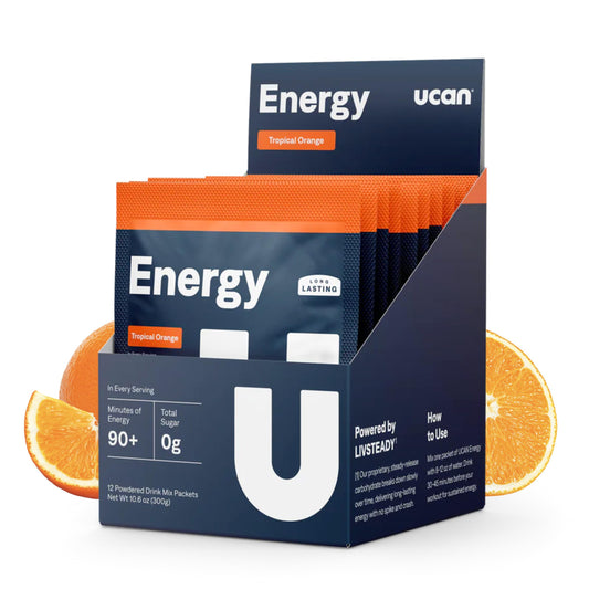 UCAN Energy Powder Tropical Orange jar showing keto-friendly, sugar-free workout fuel for athletes