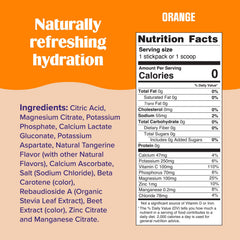 Glass of Ultima Replenisher orange flavor being poured for a refreshing drink.