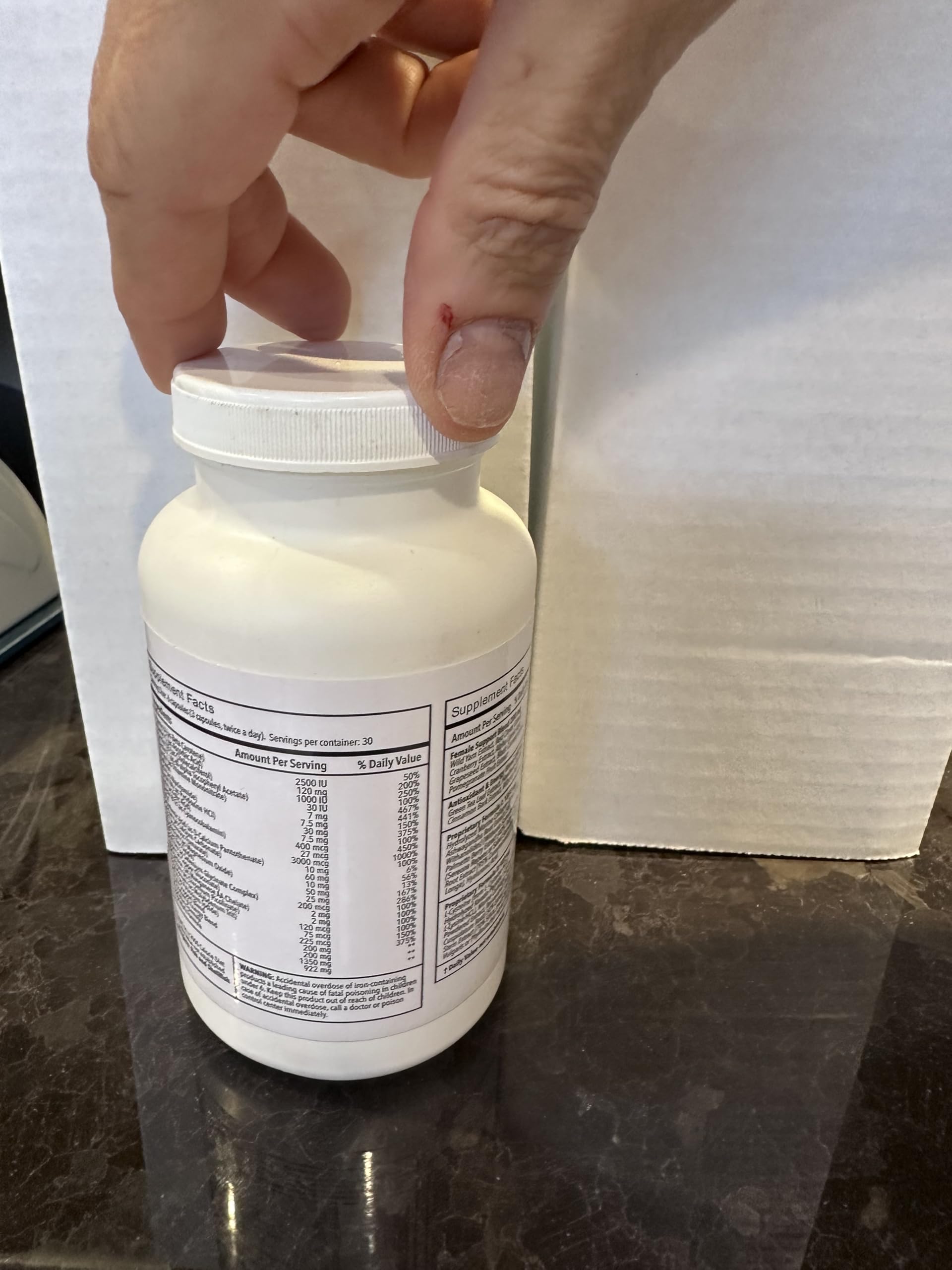 ULULIFE bottle on a vanity hints at a consistent beauty routine.