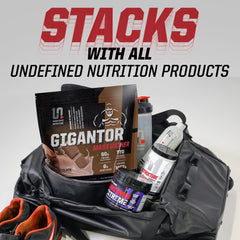 Undefined Nutrition Gigantor Mass Gainer jar and lid on kitchen counter