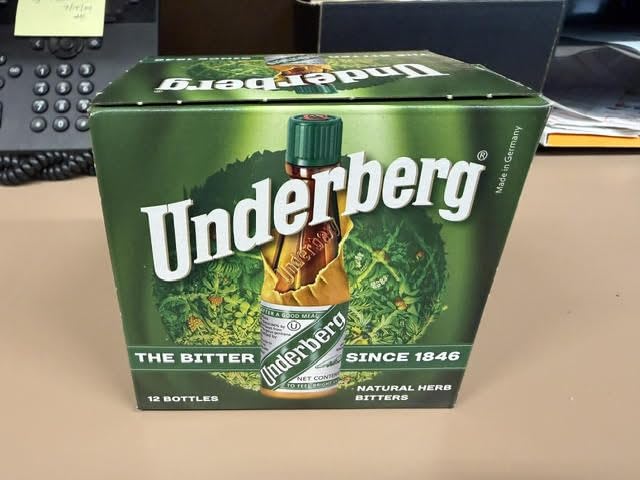 Underberg bottle closeup highlighting herbal aroma and classic packaging