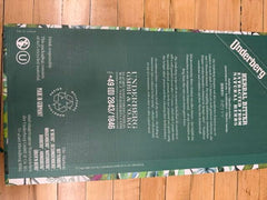 Underberg bottle inside straw-paper wrap signaling portable digestive support