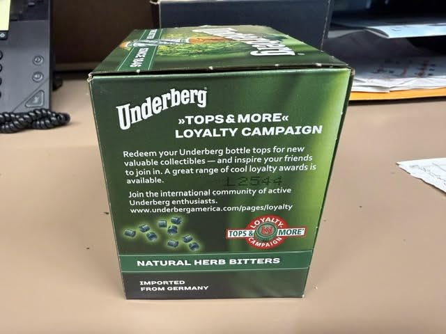 Underberg single-portion wrapper emphasizing on-the-go digestif ritual