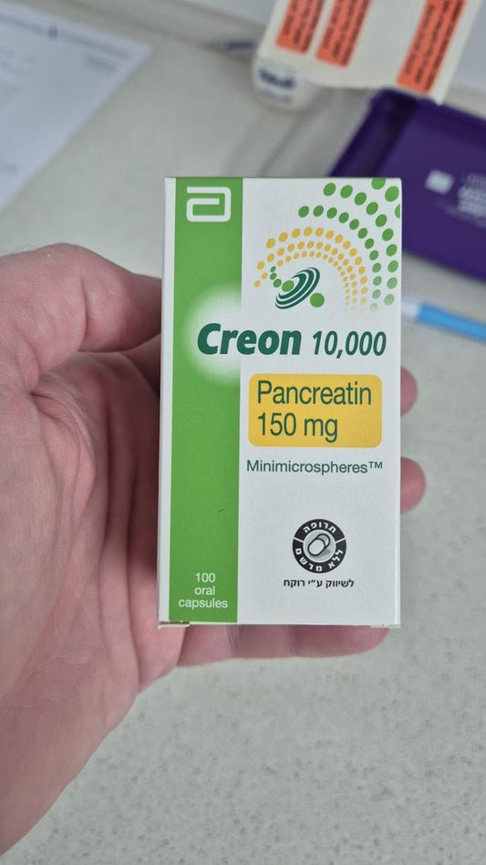 UPAX Creon 10,000 capsules being swallowed with a meal for digestion