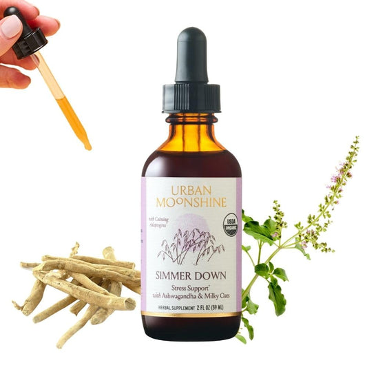 Urban Moonshine Simmer Down Tonic bottle demonstrates a calming adaptogenic blend for daily balance