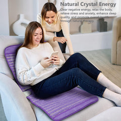 UTK amethyst energy heating pad targeting shoulders with soothing warmth.