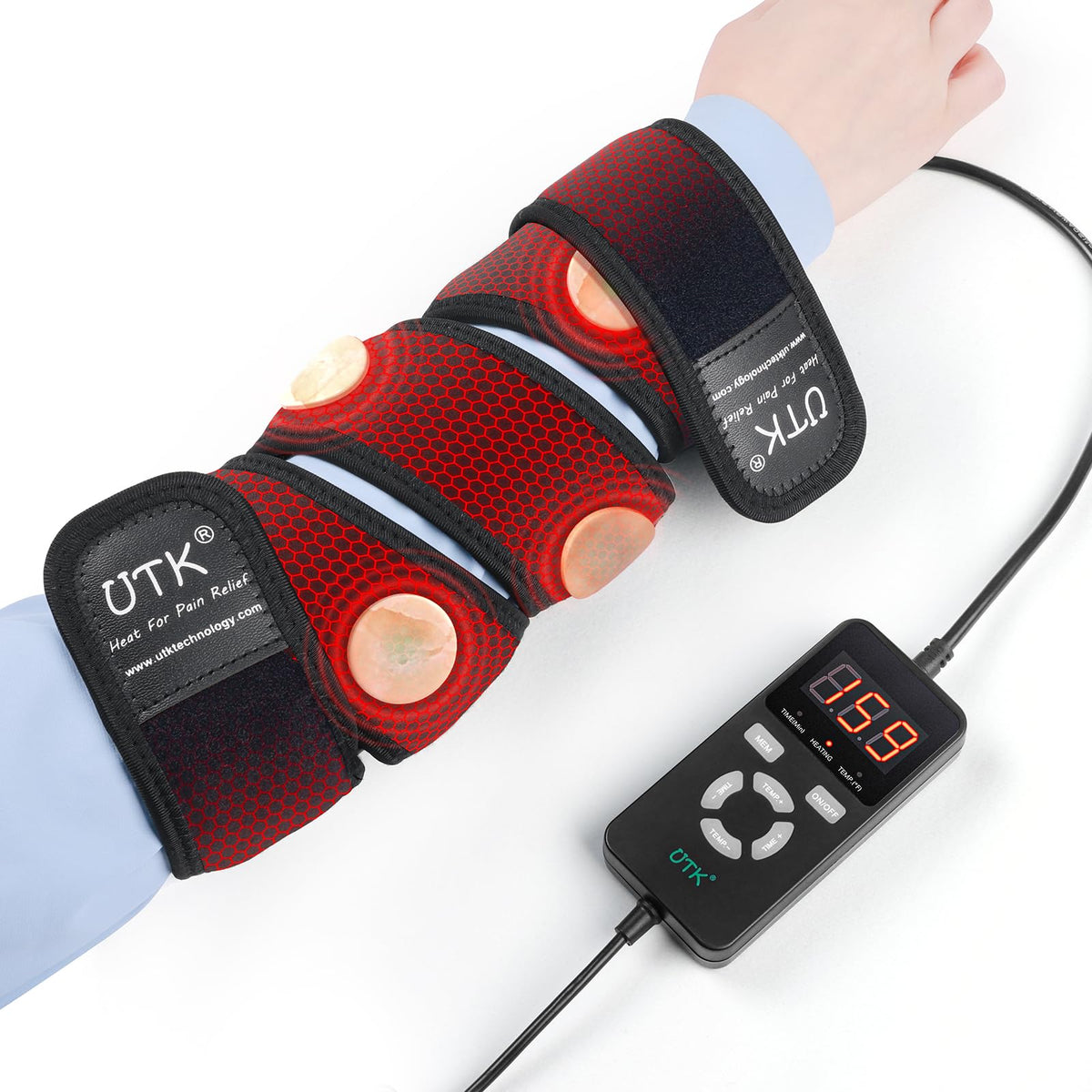 UTK far infrared heating pad wrapped around the arm for targeted elbow warmth and relief.