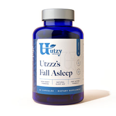 Utzy Naturals Fall Asleep bottle on nightstand supports a calm wind-down.