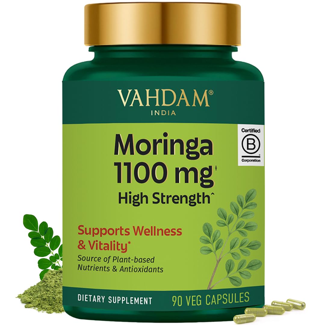 VAHDAM Moringa capsules bottle close-up highlighting 1100 mg strength for daily wellness.