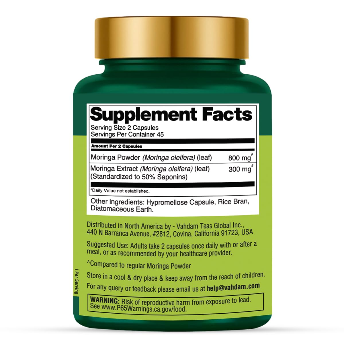 VAHDAM Moringa capsules on glass with cup, suggesting easy daily intake.