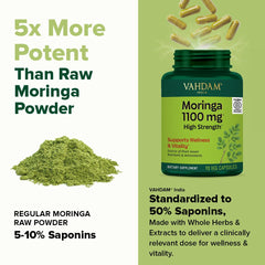 VAHDAM Moringa capsules packaging on wooden surface, eco-friendly and vegan.