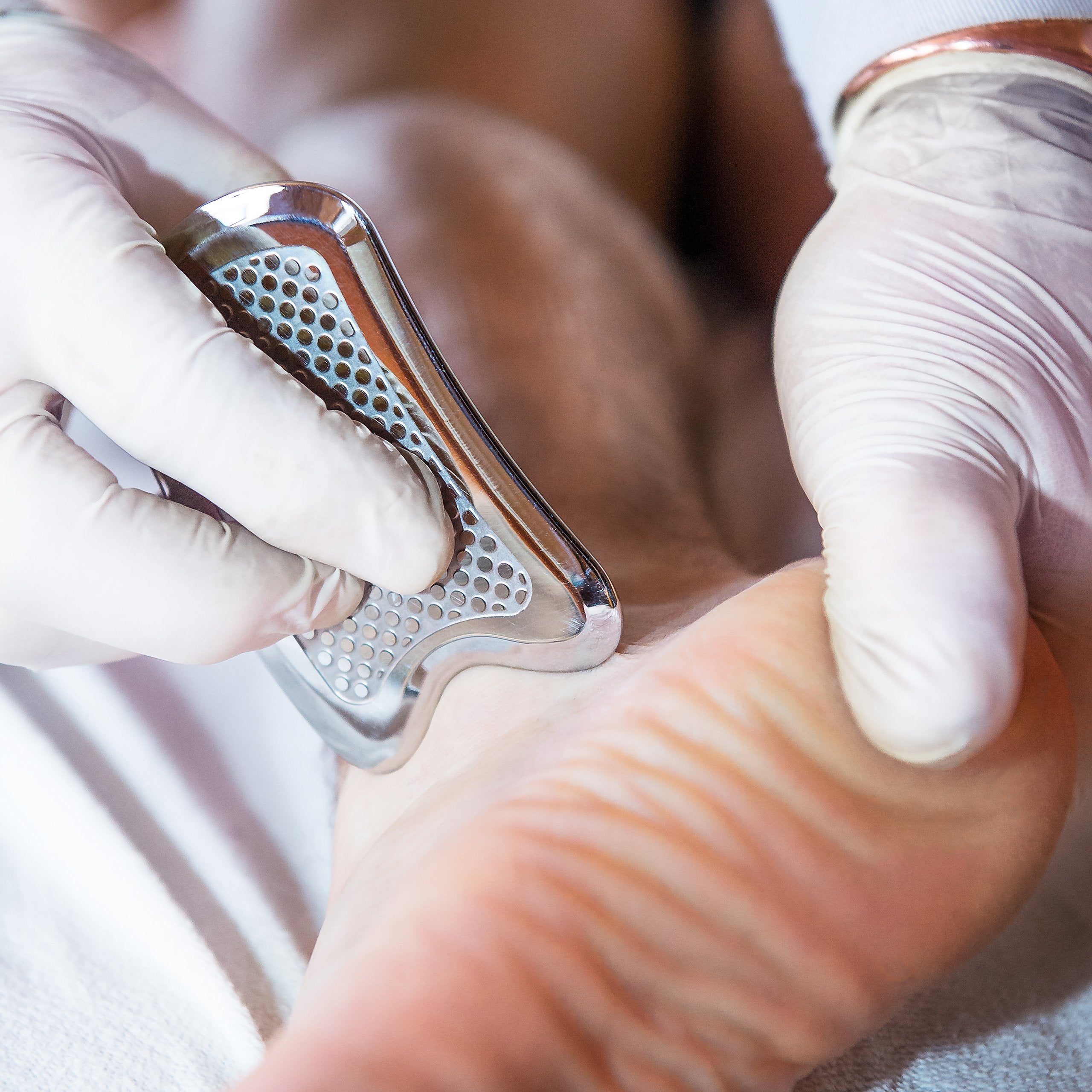 ValeoFM anti slip IASTM tool seen in therapy session