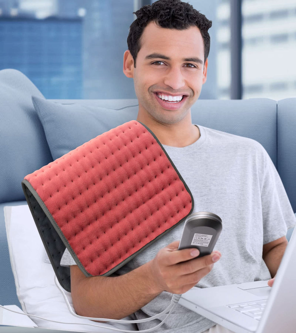 VALGELUIK heating pad draped over shoulders showing full back coverage