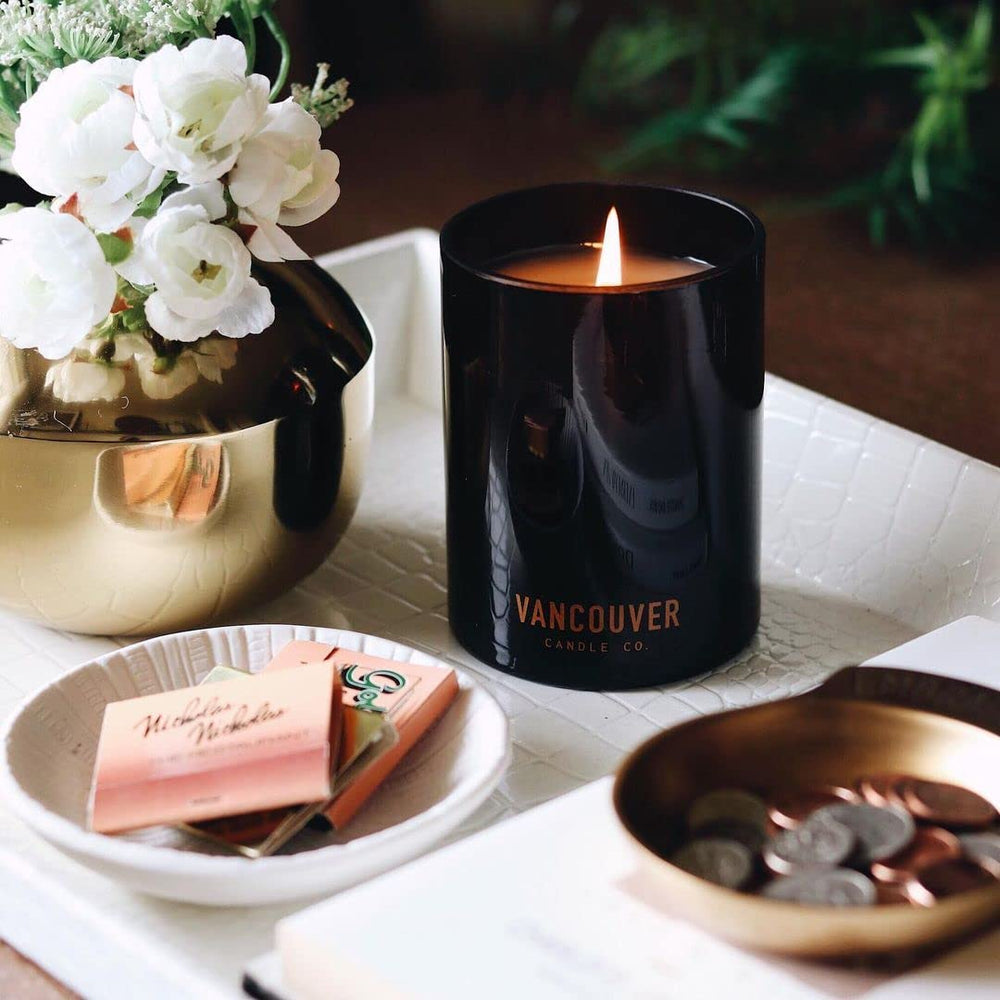 Vis Discovery Candle burning in a cozy living room fostering mindful moments