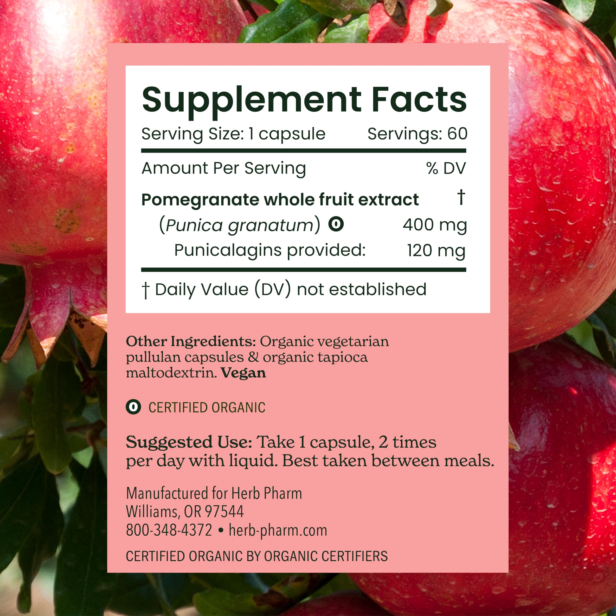 Vegan pomegranate capsules on clean background for daily antioxidant support.