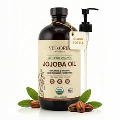 VELVORIA NATURALS jojoba oil bottle with pump for precise, mess-free application.