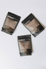 Verso Cell Being on a table with water for easy daily use and energy support.