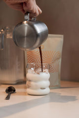 Verso Morning Being glass of water highlights hydration-first energy.