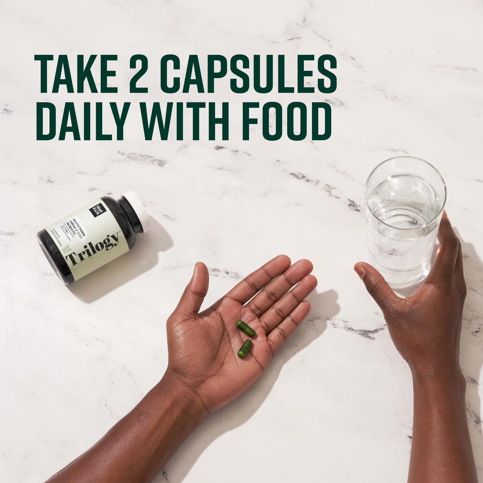 Vibrant Health Trilogy ingredients close-up emphasizes vegan and non-GMO sourcing.