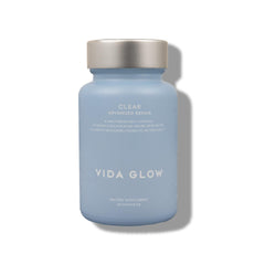 Vida Glow Clear Flawless Complexion bottle front supports daily clear skin.