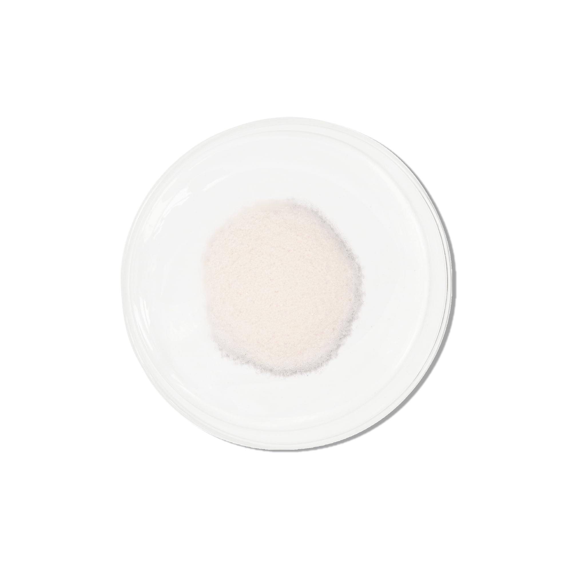 Vida Glow pineapple collagen sachets beside a glass for a convenient beauty routine.