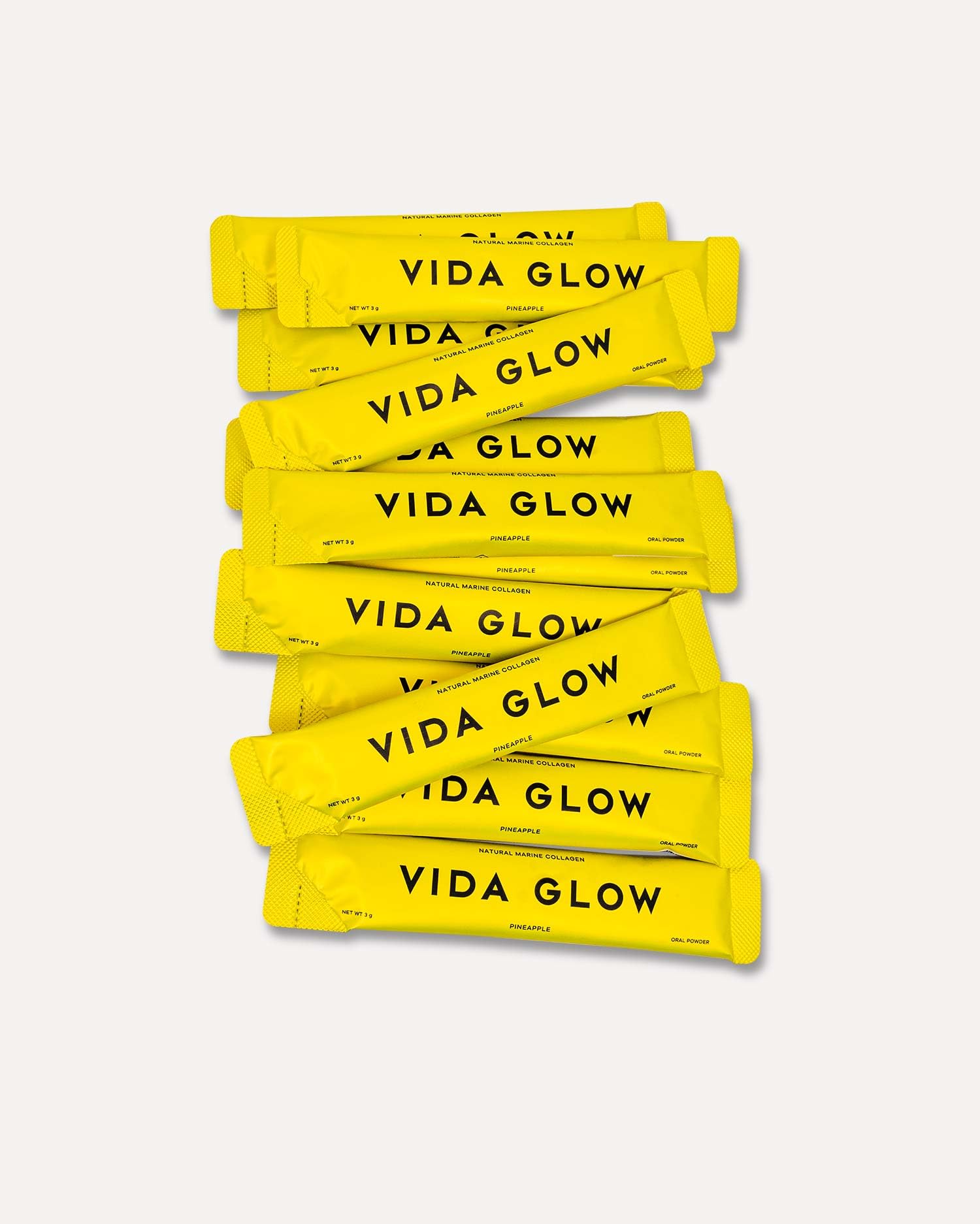 Vida Glow collagen sachet opening showing convenient on the go packaging.