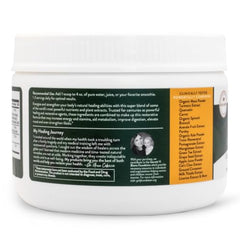 Scoop of Mighty Maca Mango powder for a quick energy boost.