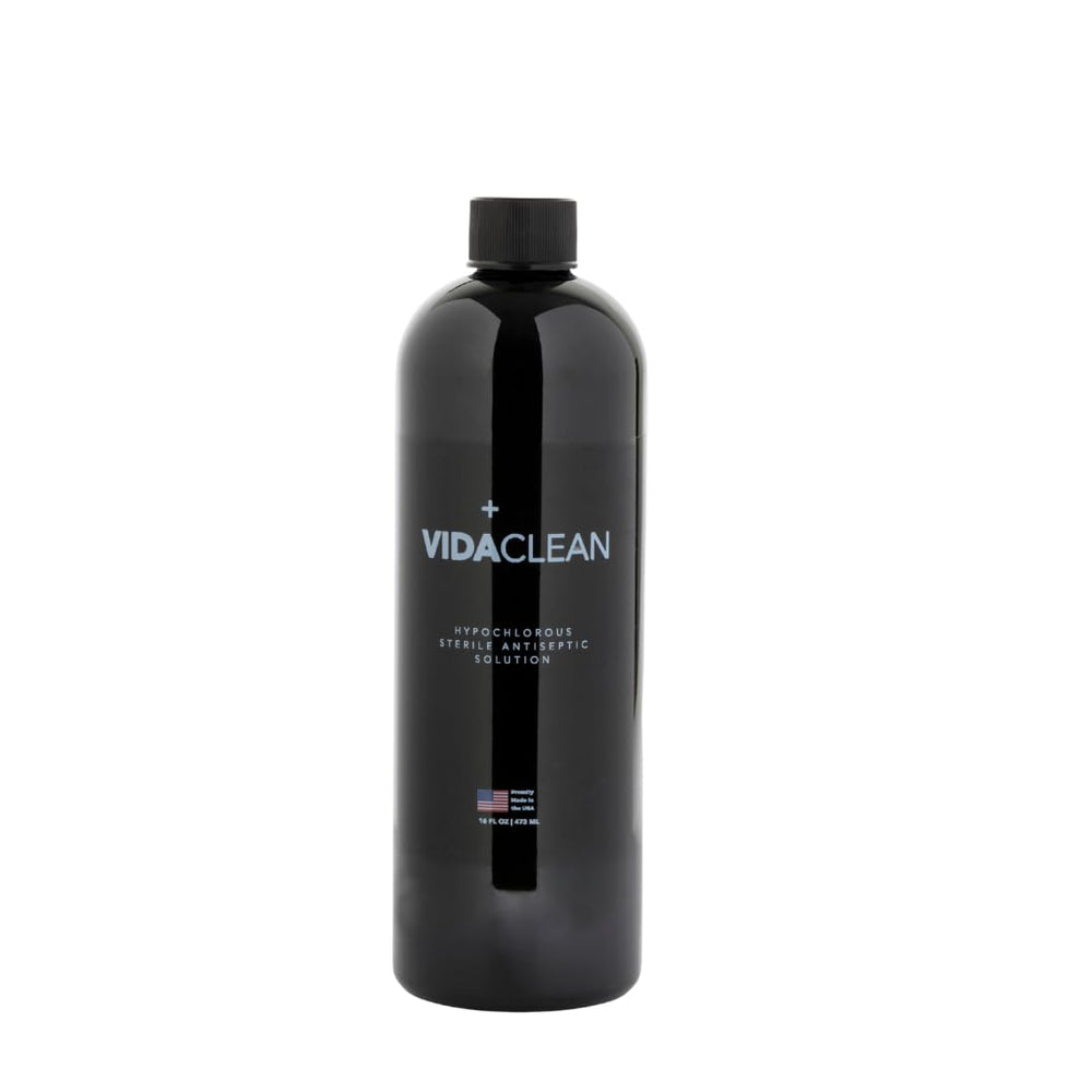VidaSolutions VidaClean bottle pour demonstrates gentle antiseptic action for skin care.