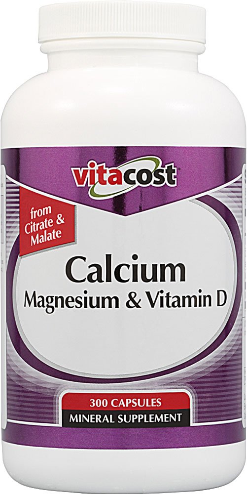 Vitacost Calcium Magnesium Vitamin D bottle label highlights minerals for bone support.