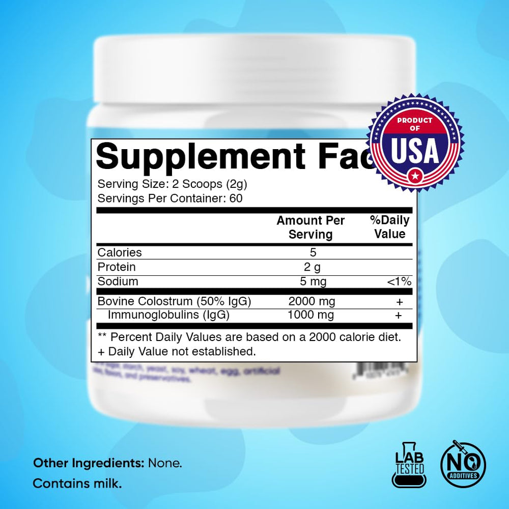 Scoop of Vitamatic Bovine Colostrum Powder showing 2 g serving for easy daily use.