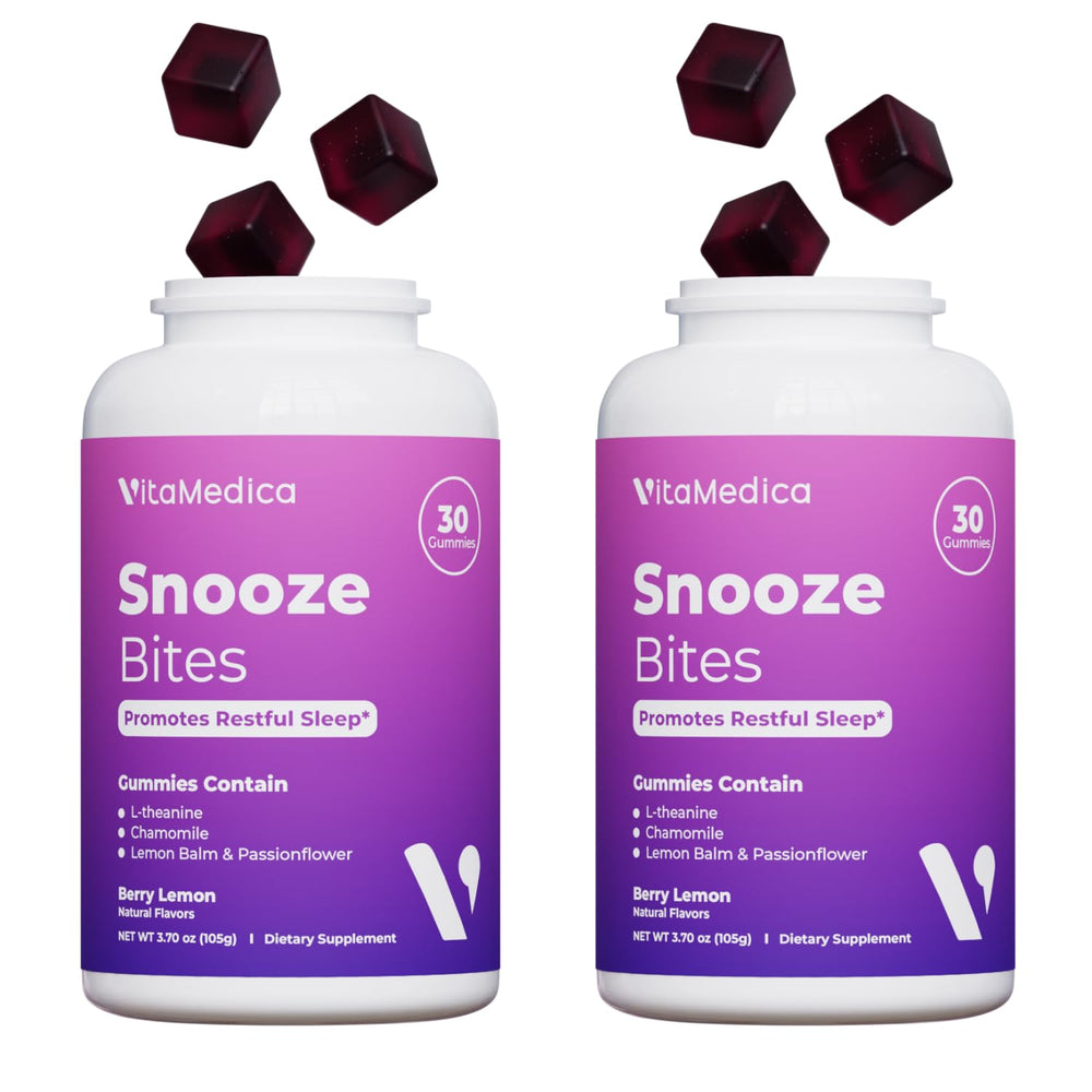 VitaMedica Snooze Sleep Gummies bottle on a nightstand for bedtime convenience.