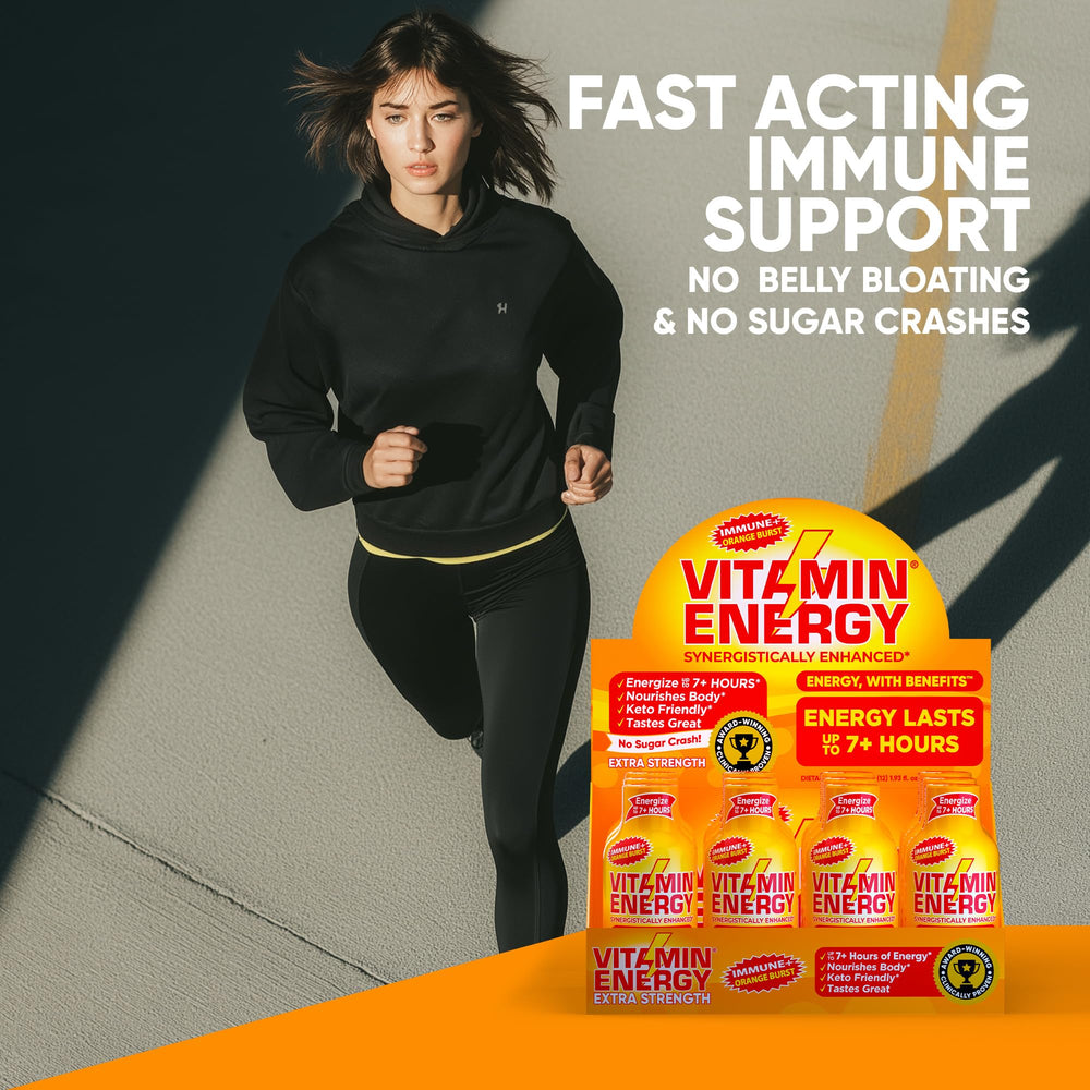 Vitamin Energy Immune+ Orange Burst glass with shot for a quick lift.
