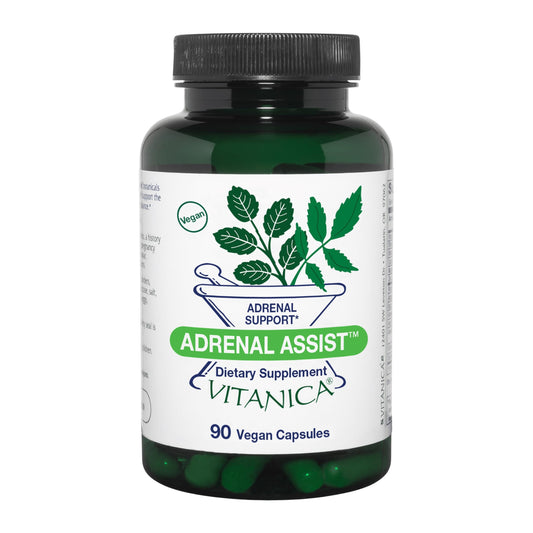 Vitanica Adrenal Assist bottle with capsules on a desk for daily adrenal support