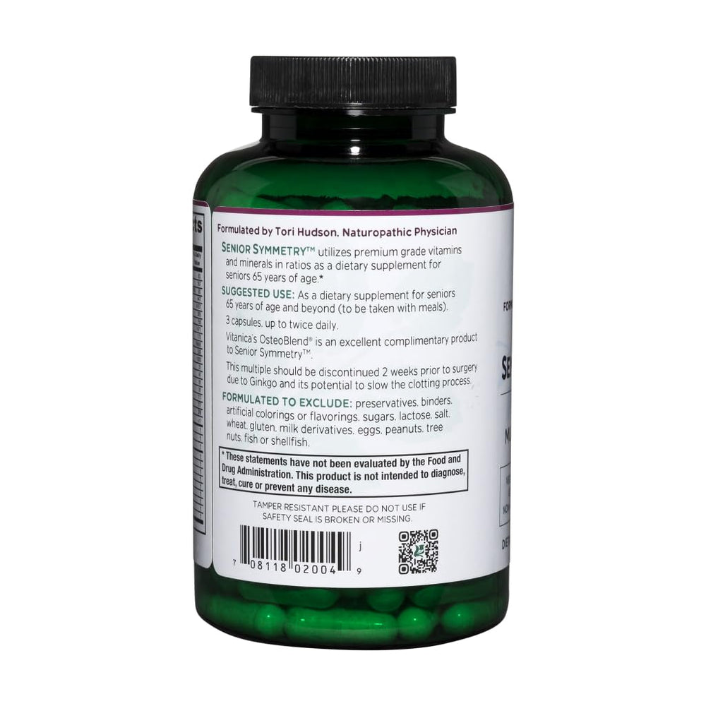 Vitanica Senior Symmetry capsules pile highlighting plant-based multivitamin with enzymes.