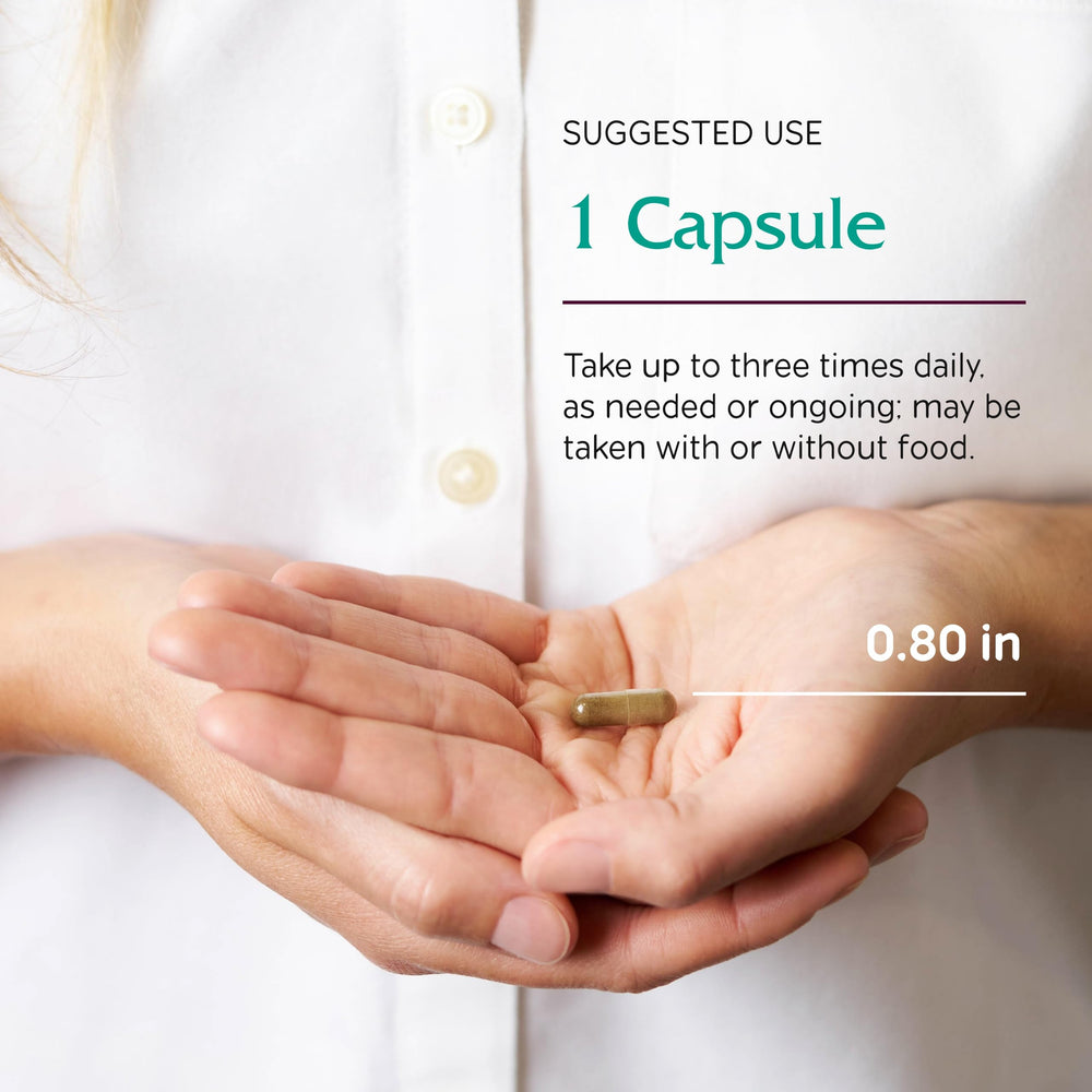 Pouring Vitanica Uplift bottle illustrating easy dosing for temporary mood support.