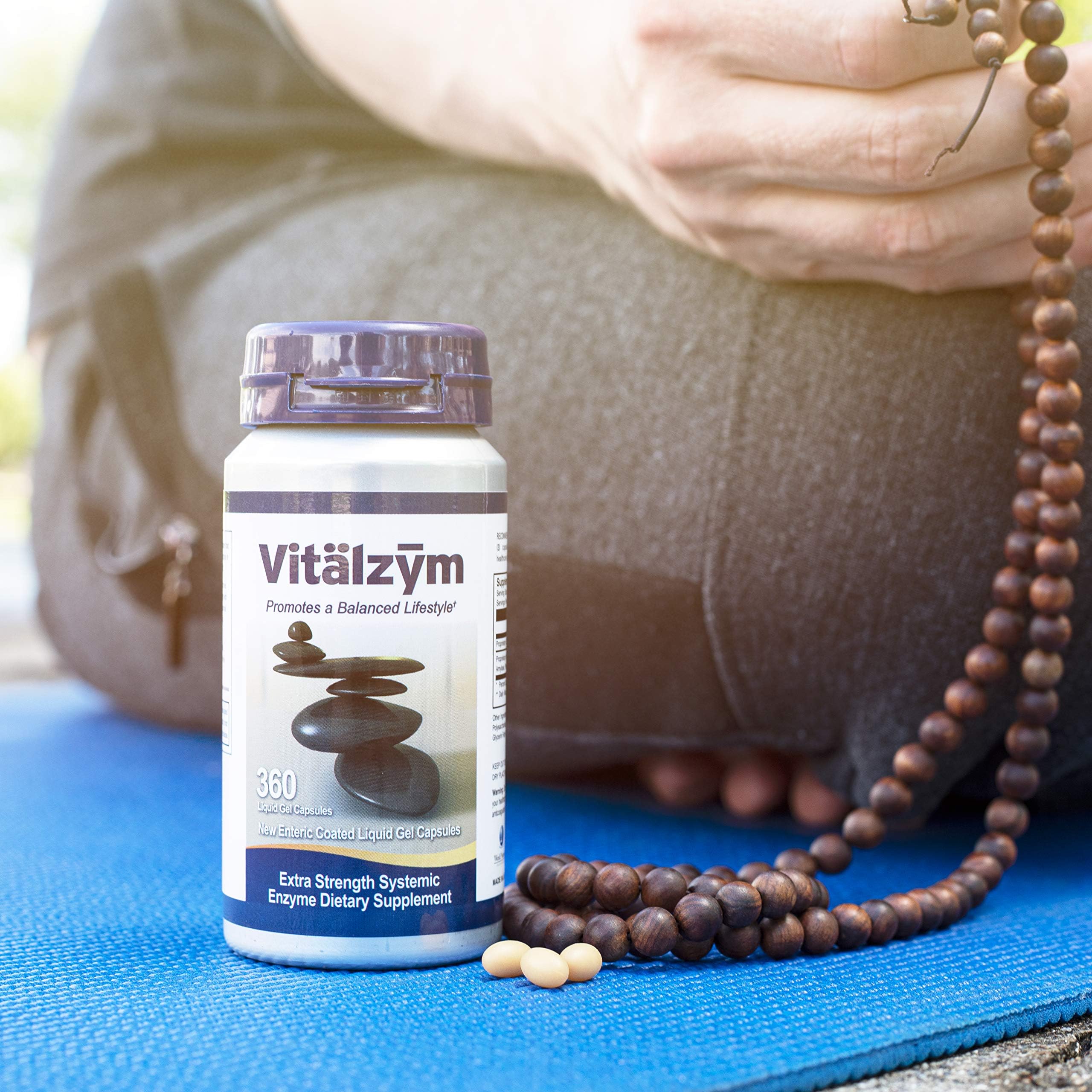 VITÄLZYM daily-use capsules close-up ready for routine