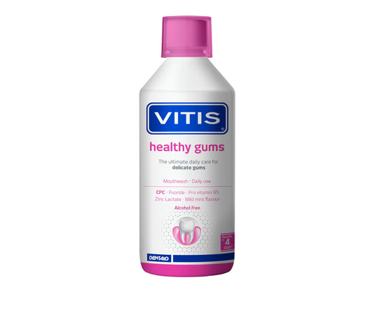 VITIS gingival mouthwash bottle pour demonstrates easy dosing for gum care