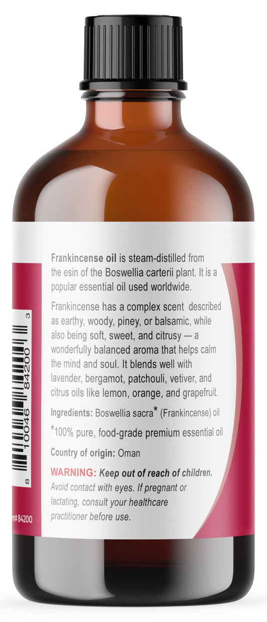 Viva Doria frankincense essential oil amber bottle on wood for mindful calm.