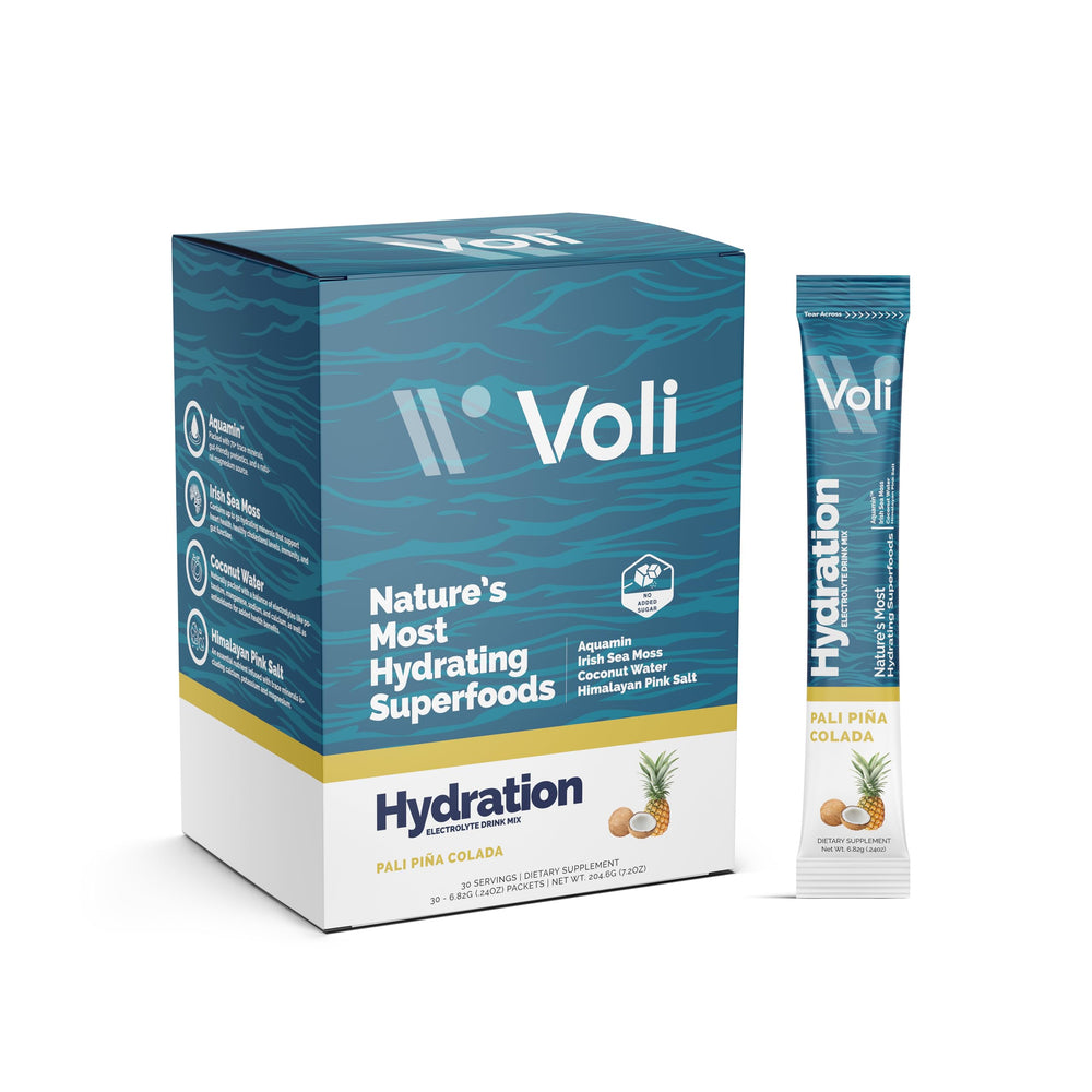 Voli Electrolytes Pina Colada packets dissolving for natural hydration after workouts