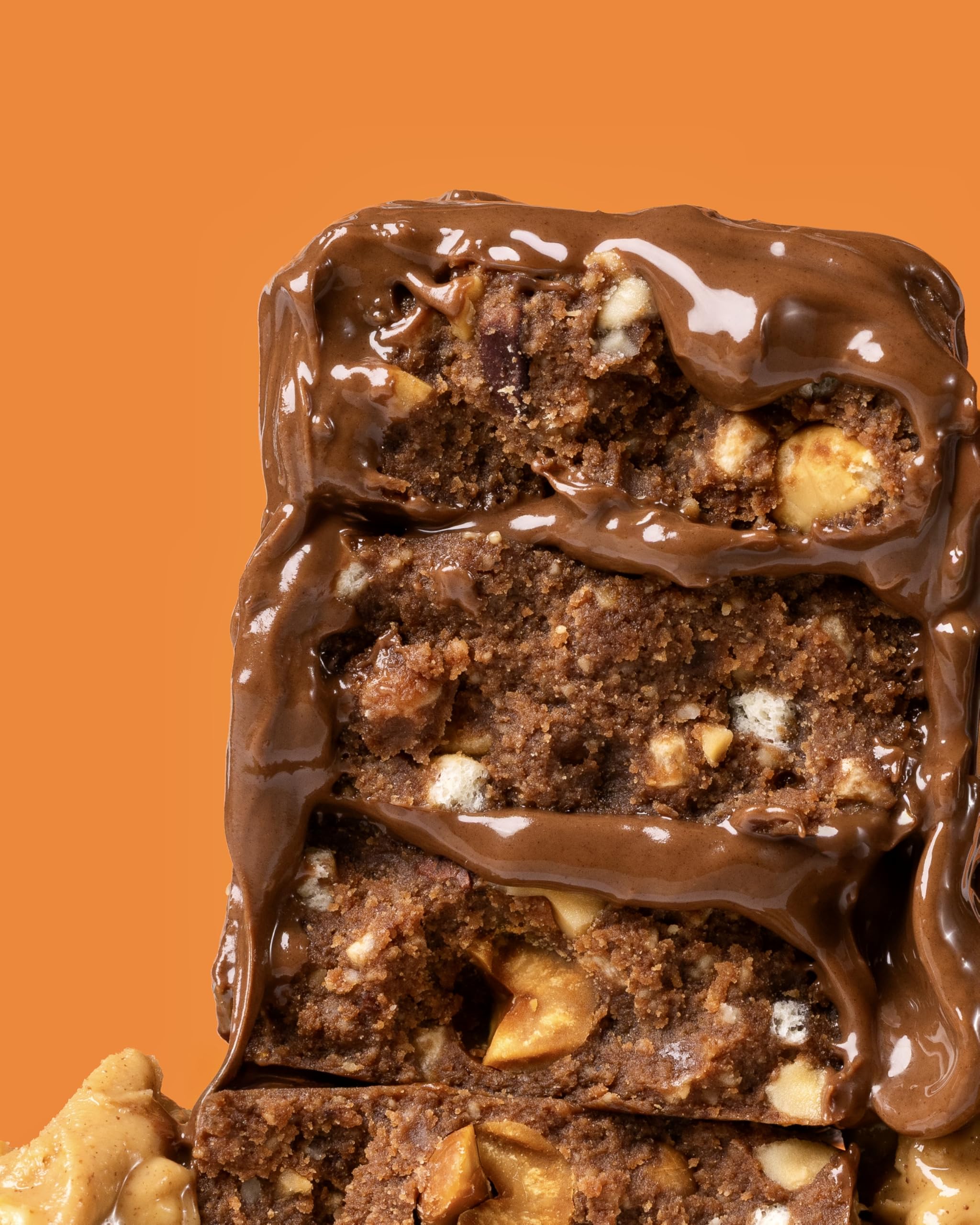War on Sugar Chocolate Peanut Butter Crunch bar unwrap shows gluten-free, monk fruit sweetened treat.