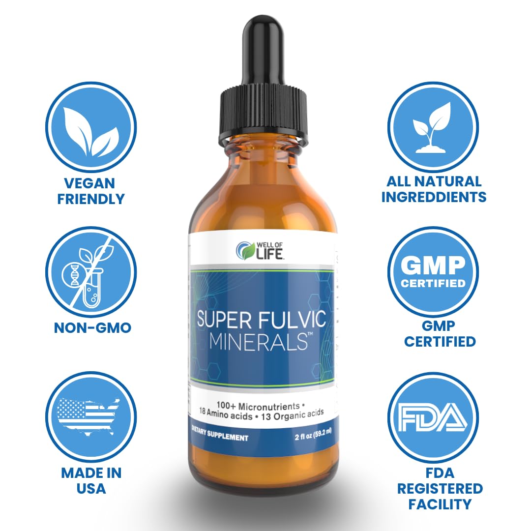 Glass of juice with Well of Life Super Fulvic Minerals drops mixed in