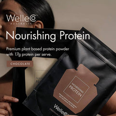 WelleCo chocolate protein powder scoop close-up showing smooth texture